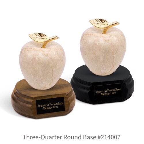 black and a brown walnut three-quarter round bases with black brass plates and botticino beige marble apples