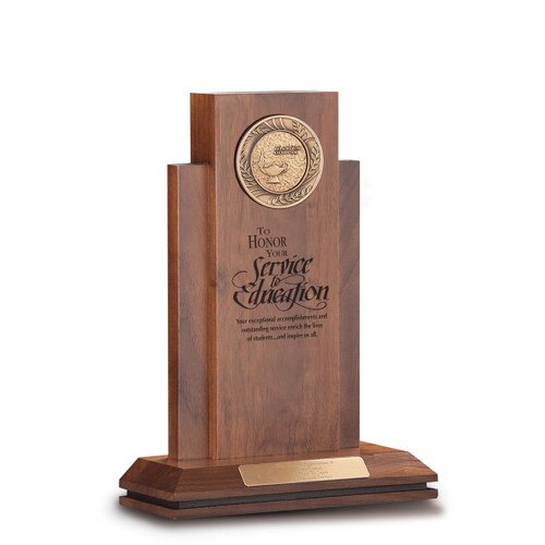 walnut column with brass medallion and service to education message and personalized brass plate