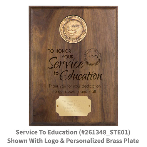 solid walnut plaque with brass medallion and service to education message