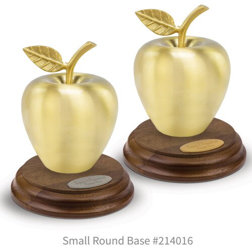 round walnut bases with brushed gold apples