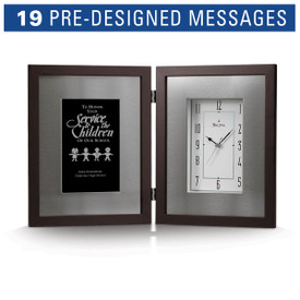Bulova Large Framed Clock with brushed aluminum inner frame and espresso-brown solid wood outer frame. Displays pre-designed recognition message on the left side.