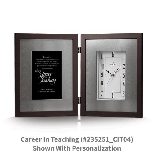 large framed clock with career in teaching message