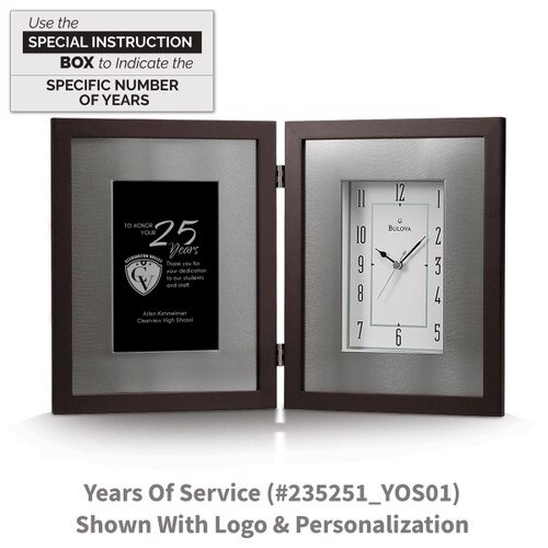 large framed clock with years of service message