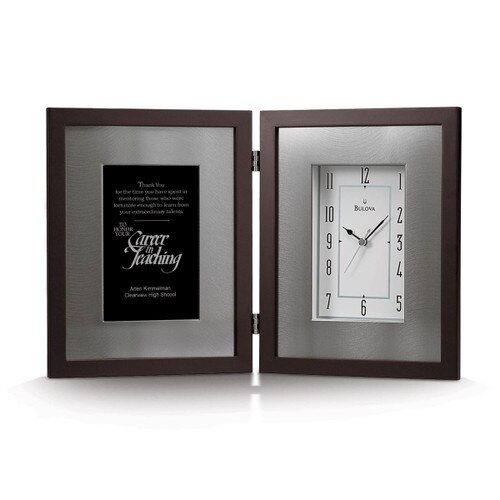 large framed clock with career in teaching message