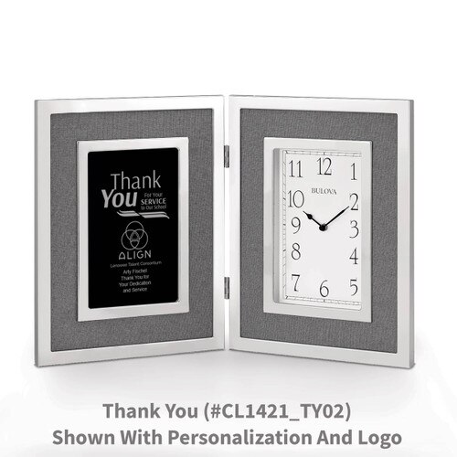 large silver framed clock with thank you message