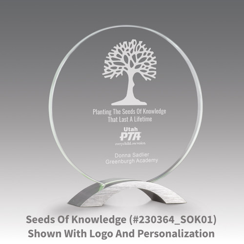 base award with circular jade tinted faceted glass and seeds of knowledge message