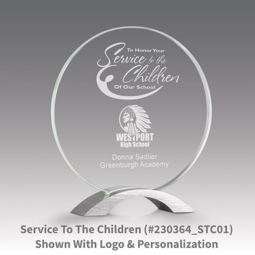 base award with circular jade tinted faceted glass and service to the children message