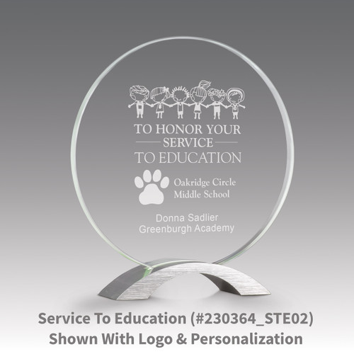 base award with circular jade tinted faceted glass and service to education message