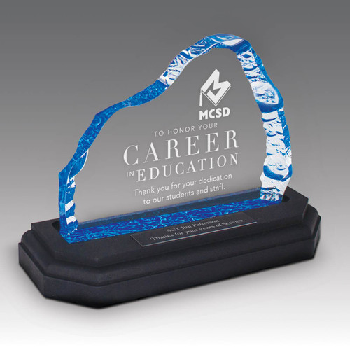 blue acrylic iceberg with career in education message an black walnut base