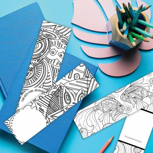 geometric coloring bookmark laying on a desk