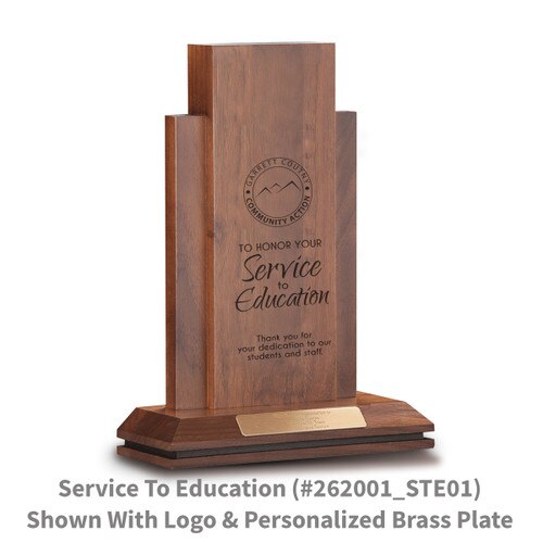 walnut column with service to education message and personalized brass plate