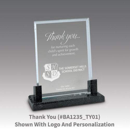 crystal award with marble base featuring thank you message