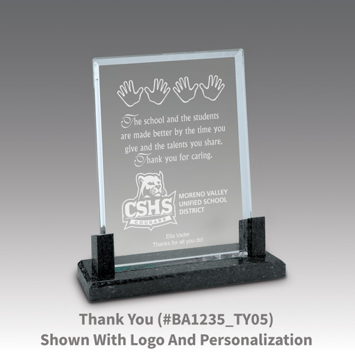 crystal award with marble base featuring thank you message