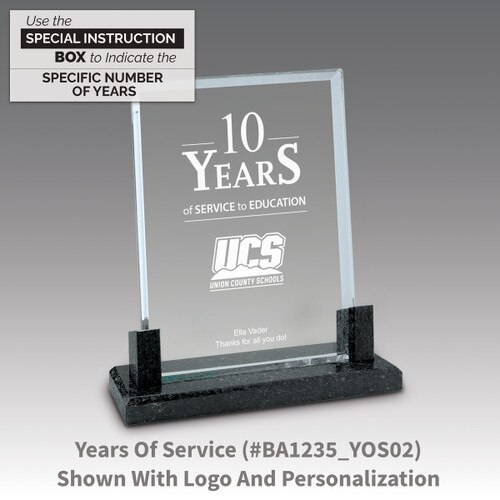 crystal award with marble base featuring years of service message