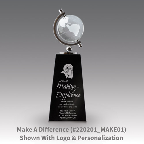 crystal globe sits atop a black crystal base with making a difference message