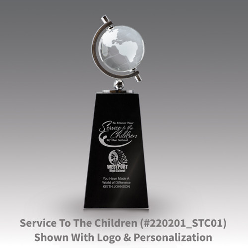 crystal globe sits atop a black crystal base with service to the children message