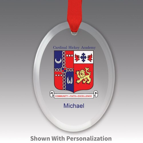 oval crystal ornament with custom logo and red ribbon