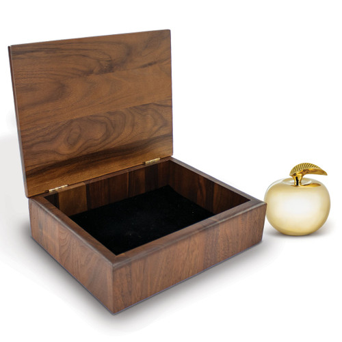 large walnut memory with lid open and a golden apple