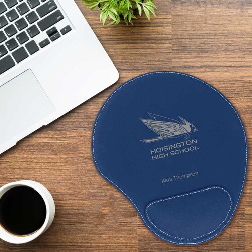 blue leather mouse pad with custom logo sitting on a desk