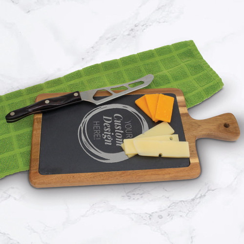 slate and acacia wood paddle cutting board with cheese