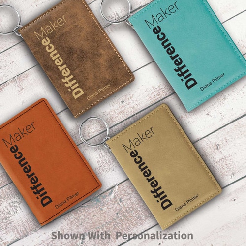 multiple colors of leather id holders with difference maker message