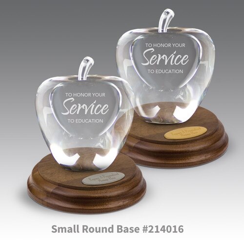 round walnut bases with brass and silver plates and optic crystal apples with service to education messsage
