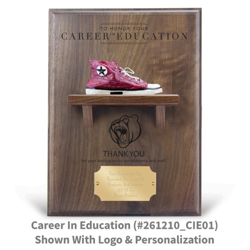 career in education message on a walnut plaque with a shelf, resin red shoe and personalized brass plate