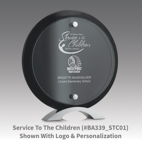 circle jade glass suspended on a black piano finish base award with service to the children message