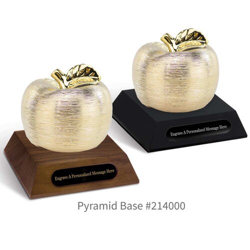 black and a brown walnut pyramid bases with black brass plates and gold spun apples