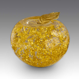 Handblown crystal apple featuring 23K gold leaves on the inside.