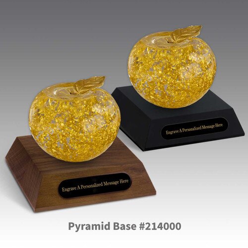 black and a brown walnut pyramid bases with black brass plates and handblown 23k gold apples