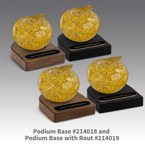 black and brown walnut podium bases with black brass plates and handblown 23k gold apples