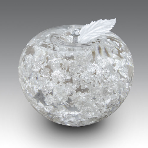 Handblown crystal apple featuring the finest pure silver leaves on the inside.