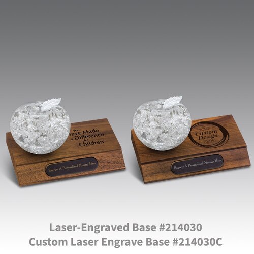 laser engraved walnut bases with black brass plates and handblown fine silver apples