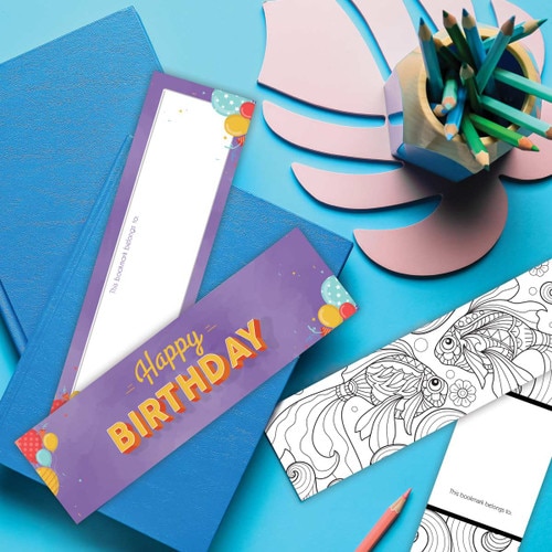 happy birthday bookmark laying on a desk