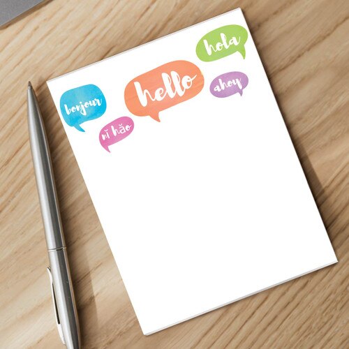 hello speech bubbles notepad sitting on a desk