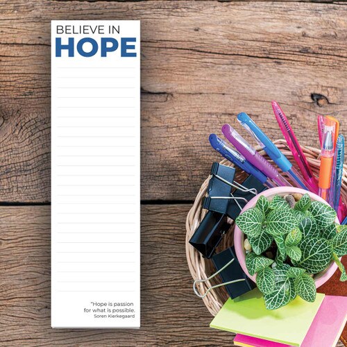 believe in hope notepad sitting on a desk