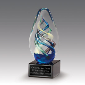 crystal statue with blue, yellow and green swirls on black crystal base