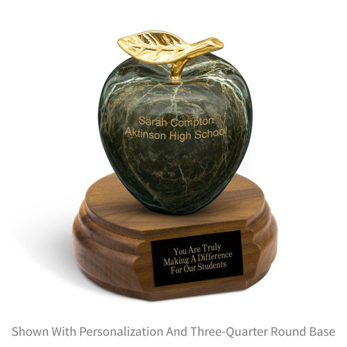 personalized green marble apple sitting on top a walnut base with black brass plate