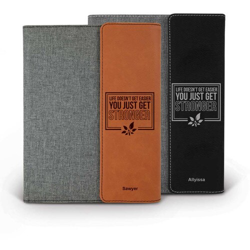 heather gray padfolios with black and rawhide accents featuring Life Doesn't Get Easier message