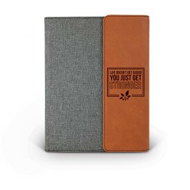 This Canvas/Vegan Leather Padfolio With Notepad Features The Inspirational Message “Life Doesn’t Get Easier You Just Get Stronger”