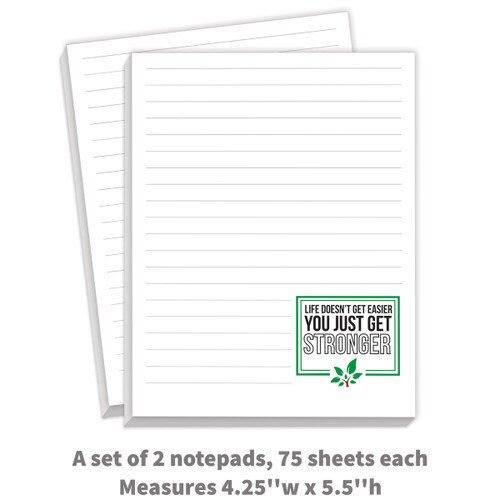 2 notepads with “Life Doesn’t Get Easier You Just Get Stronger” message