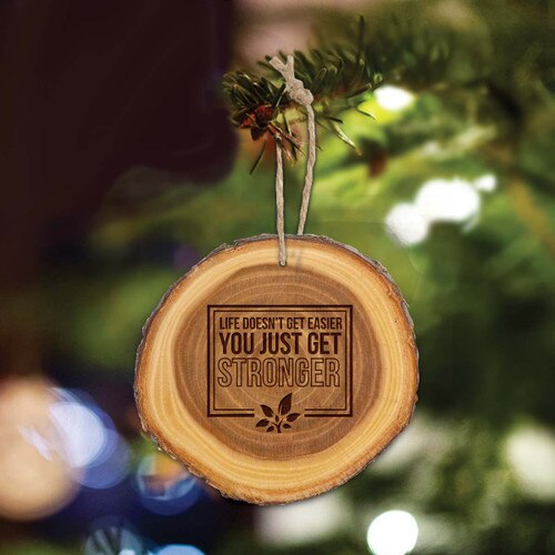 wooden ornament with you just get stronger message