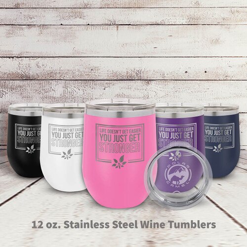 multiple colors of stainless steel stemless wine tumblers with Life Doesn't Get Easier message