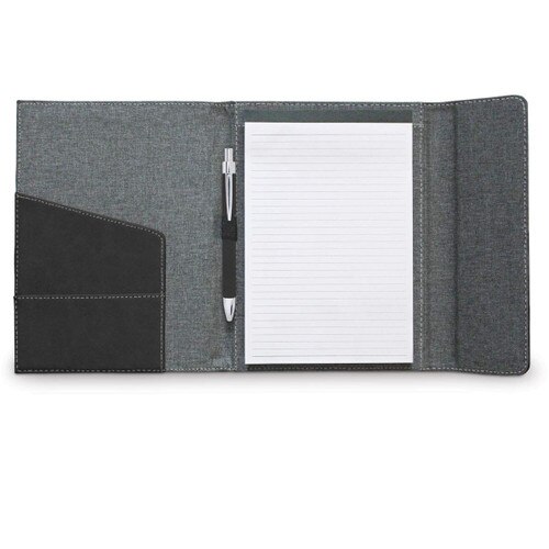 opened padfolio with lined notepad and black pen