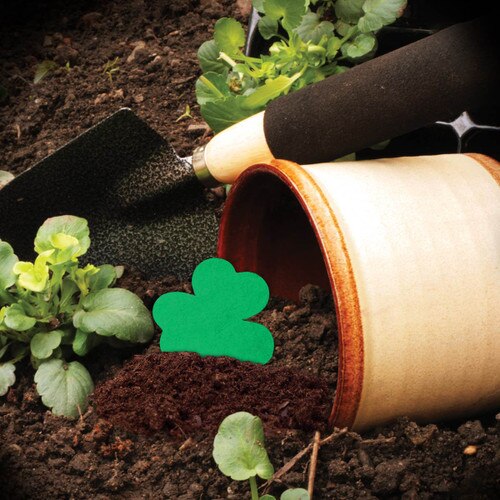 flower pot with dirt and shovel