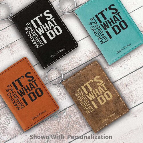multiple colors of leather id holders with making a difference message