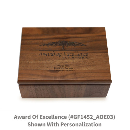 Small walnut memory keepsake box with laser-engraved award of excellence message.