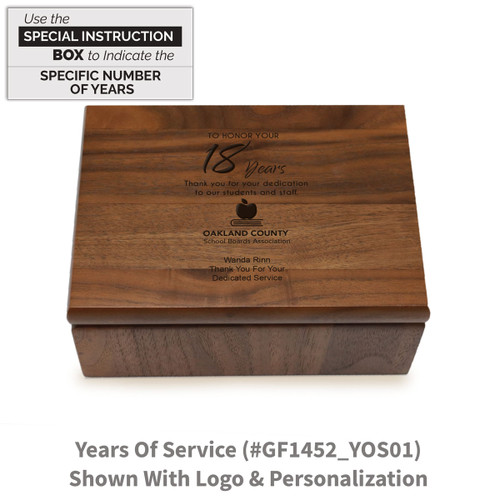 Small walnut memory keepsake box with laser-engraved years of service message.