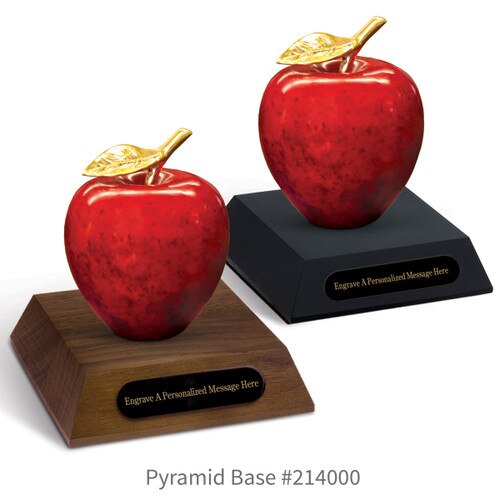 black and a brown walnut pyramid bases with black brass plates and natural stone apples